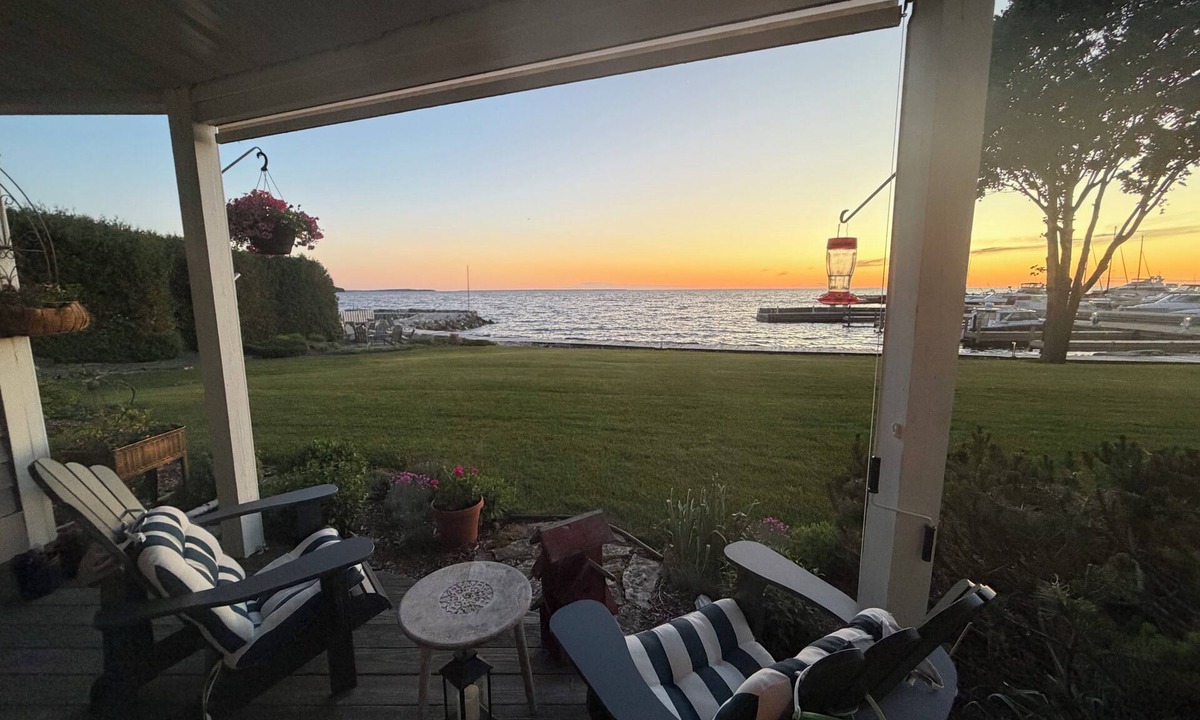 Sister Bay Condo | Cozy Sister Bay Waterfront! Ground level porch, lawn, pier, bay, garage parking