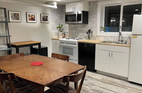Alphabet Historic District Apartment | A pied-à-terre near bistros, shops, and sports stadium w/parking and EV charger