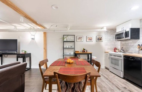 Alphabet Historic District Apartment | A pied-à-terre near bistros, shops, and sports stadium w/parking and EV charger