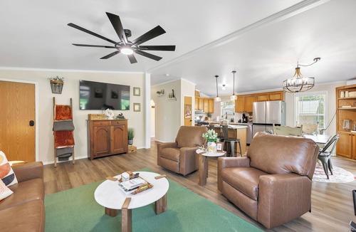 Mountain House | Brand new listing! Relax and unwind at this stunning Northwoods pool house featuring a private in-ground pool, fire pit, patio, garage space, and sleeping for 11 guests!