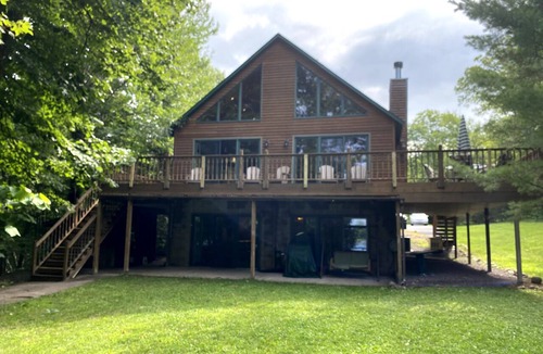 Chief Lake Cabin | Captivating Views of Lake Chippewa from Three Level Chalet Cabin & Lake Home