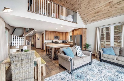 Krakow House | Highlights: Private beach just steps from your door Includes kayaks for exploring the lake Great fishing right off the shoreline or dock Bring your boat and enjoy full boating access Cozy indoor fireplace for cool evenings 4 spaciou