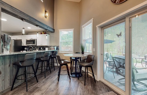 Mason County House | Inviting riverfront home with hot tub, firepit, W/D, & dog-friendly