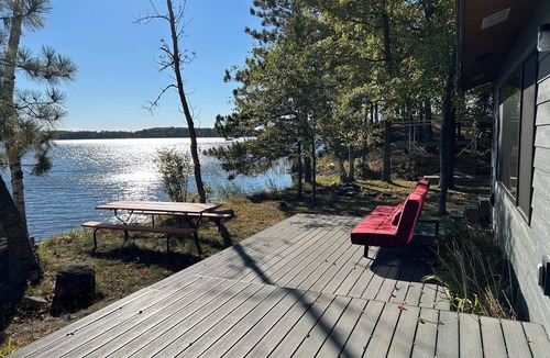 Longville Cabin | Recharge at this tranquil getaway, inches from Lake Wabedo!