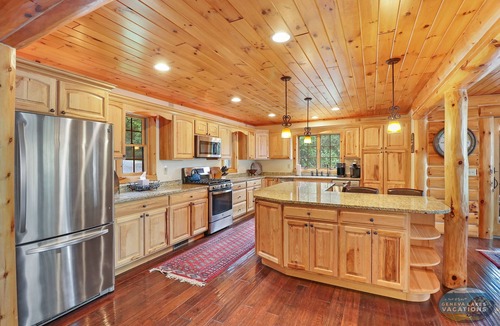 Whitewater House | Waterfront, Hand-Crafted Log Cabin |Sandy Beach |Dock |5200 Sq Ft |3.5 Acres |Stone Fireplace |Views