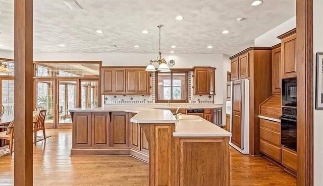 12,000 Sq. Ft. Home on 15 hunting acres with an in-door pool and sauna in Burlington