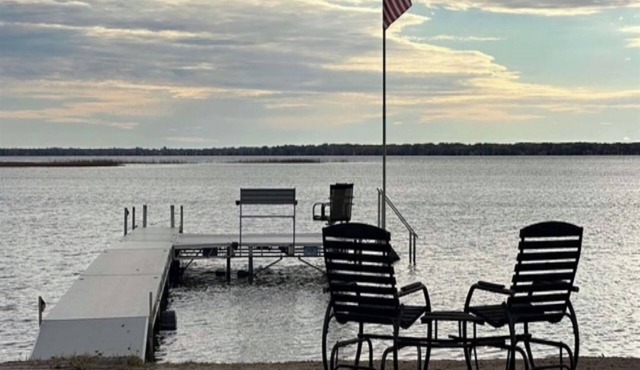 Cozy lakefront home rests on Shawano Lake - swimming, fishing, boating, dock. in Shawano