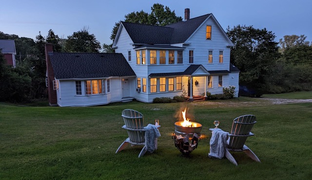Enjoy comfortable elegance in this secluded grand home located in town in Lenox