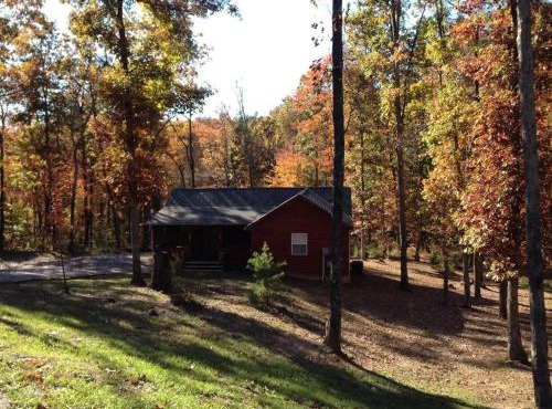 Gas fireplace, firepit, and cedar Adirondack chair in Spencer