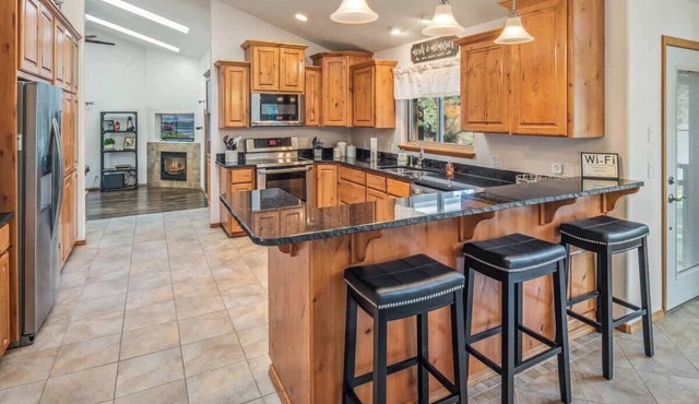 Luxury Riverfront Escape with Kayaks & Views in Post Falls