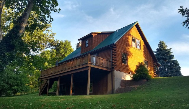Secluded Riverside Log Home in Southern Michigan in Centreville