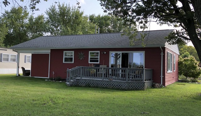 Spectacular sunset views and north chain lake front red cottage rental in Coldwater
