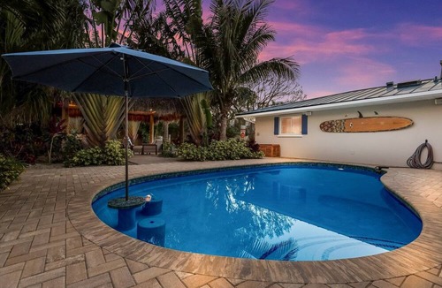 Palma Sola House | Tropical Tiki:Outdoor Oasis, Tiki Hut, Pool by Anna Maria Life Vacation Rentals