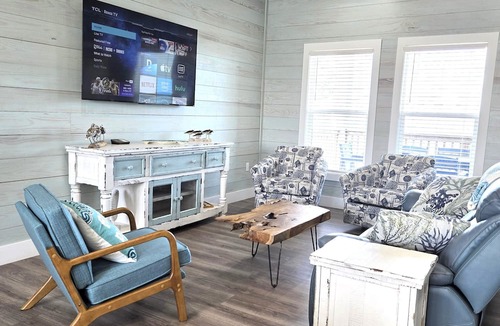 Fulton House | Dancing Dolphin-Waterfront! Hot Tub, Arcade, Pool, Gas Grill-Walk to Pier & Pubs