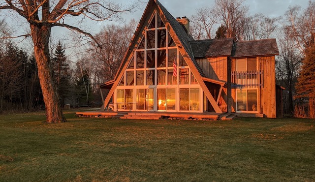 "A" frame cottage on the shore of Lake Michigan in Cedar Grove